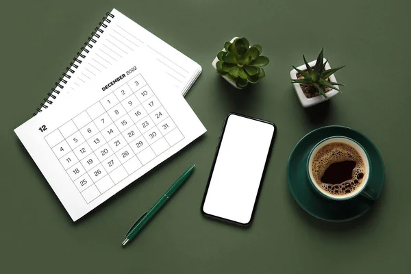 Paper Calendar December 2022 Notebook Pen Houseplants Mobile Phone Cup — Stock Photo, Image