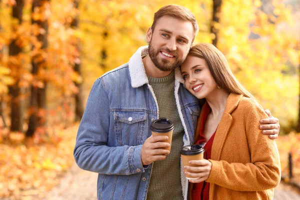 Young Beautiful Couple Holding Paper Cups Drink Autumn Park — Stock Photo, Image