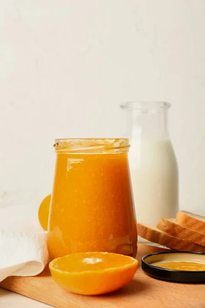 Jar Tasty Tangerine Jam Milk Light Background — Stock Photo, Image