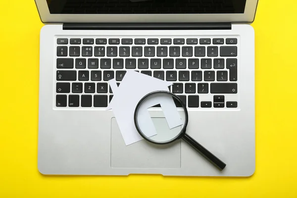 Laptop Paper House Magnifier Yellow Background — Stock Photo, Image
