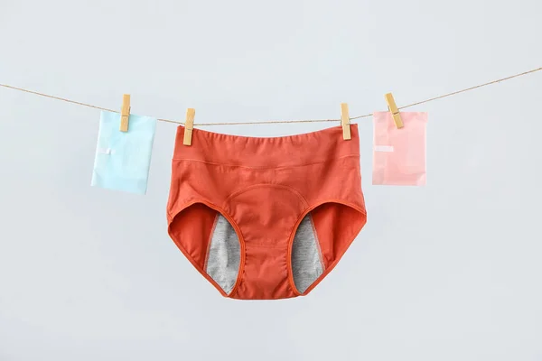 Period Panties Pads Hanging Rope Grey Background — Stock Photo, Image