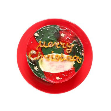 Beyaz arka planda Noel Bento pastası olan tabak