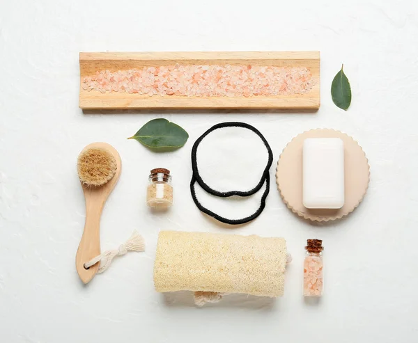 Different Bath Supplies Reusable Cotton Pads Sea Salt Light Background — Stock Photo, Image