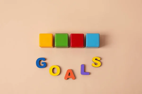 Different Color Wooden Cubes Word Goals Beige Background — Stock Photo, Image