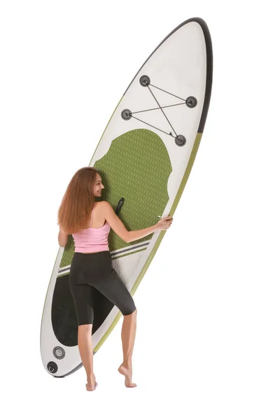 スポーティ若いです女性とともにボードのためにアップサーフィン上の白い背景 — ストック写真