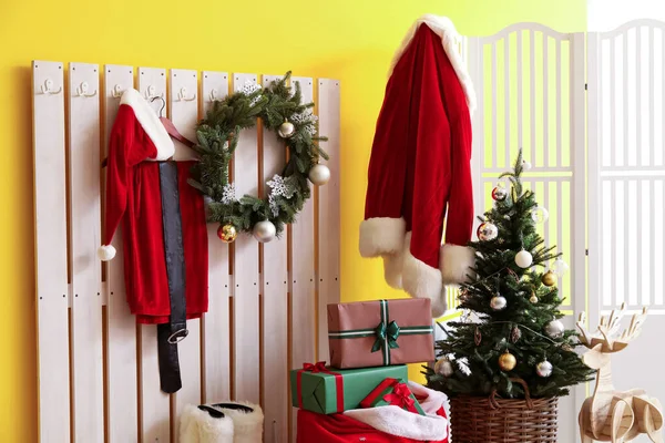 Hanger Santa Claus Costume Bag Gift Boxes Christmas Tree Hallway — Stock Photo, Image