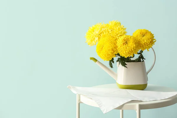 Watering Can Yellow Chrysanthemum Flowers Table Blue Wall — Stock Photo, Image