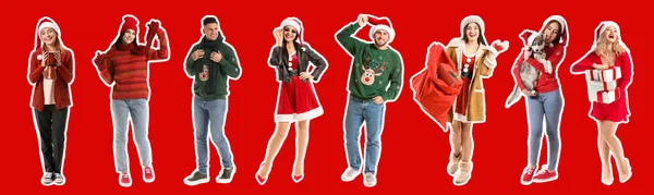 Skupina Šťastných Lidí Slaví Vánoce Červeném Pozadí — Stock fotografie