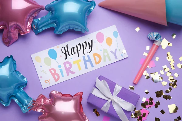 Text HAPPY BIRTHDAY and party set on purple background