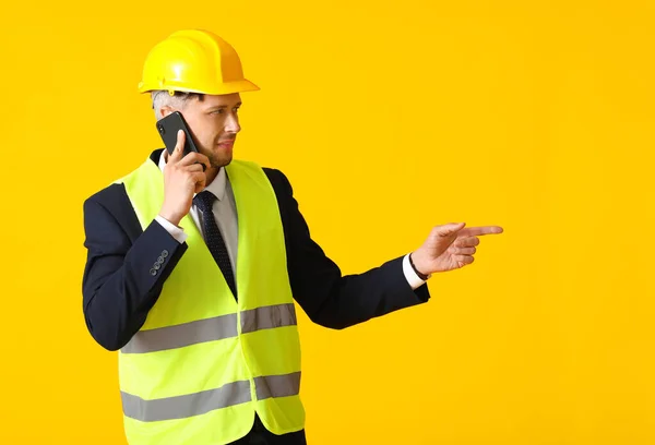 Male Architect Talking Phone Color Background — Stock Photo, Image