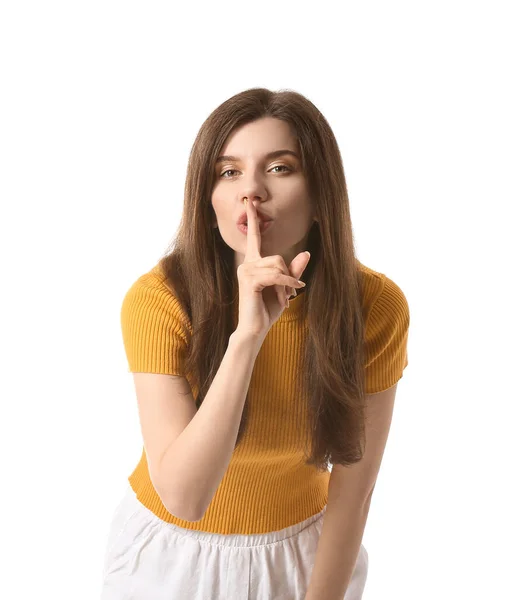 Junge Frau Zeigt Schweigegeste Auf Weißem Hintergrund — Stockfoto