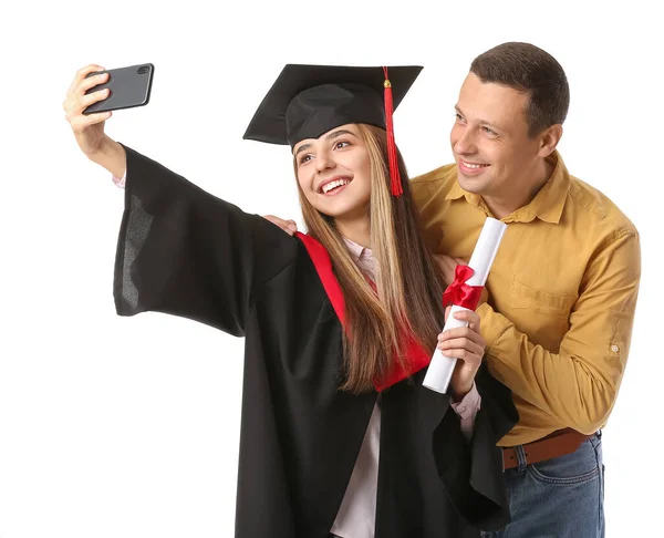 Glückliche Studentin Mit Ihrem Vater Beim Selfie Auf Weißem Hintergrund — Stockfoto