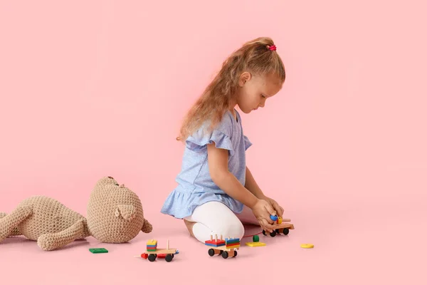 Cute Little Girl Playing Building Blocks Pink Background — Stock Photo, Image