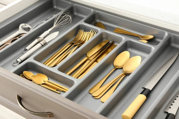 Set Golden Cutlery Utensils Open Kitchen Drawer Closeup — Stock Photo, Image