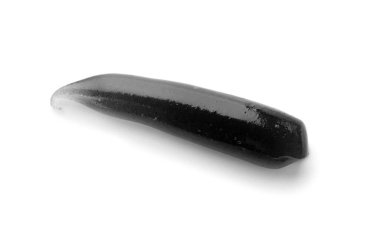 Beyaz arkaplanda siyah diş macunu örneği