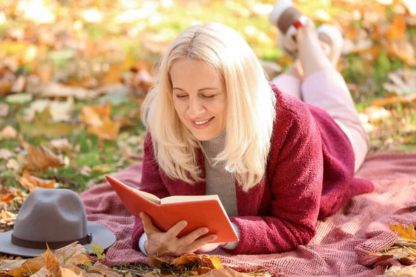 Mature Woman Reading Book Autumn Park — Stock Photo, Image