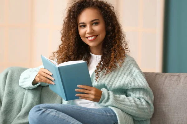 Young African American Woman Warm Cardigan Book Home — Stock Photo, Image