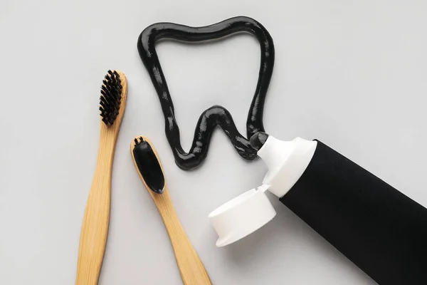 Tooth Made Black Paste Bamboo Brushes Tube Light Background — Stock Photo, Image