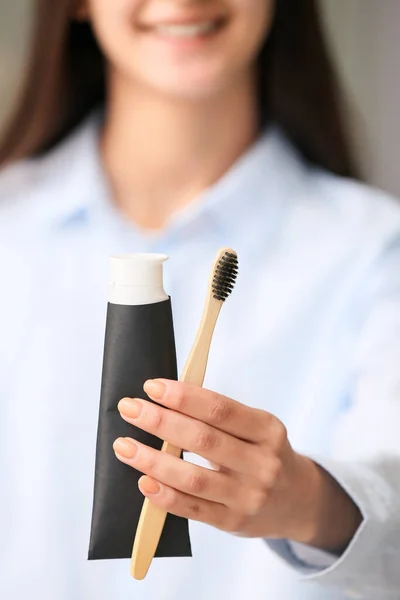 Woman Tube Black Tooth Paste Bamboo Brush Home Closeup — Stock Photo, Image