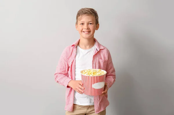 Smiling Little Boy Bucket Tasty Popcorn Light Background — Stock Photo, Image