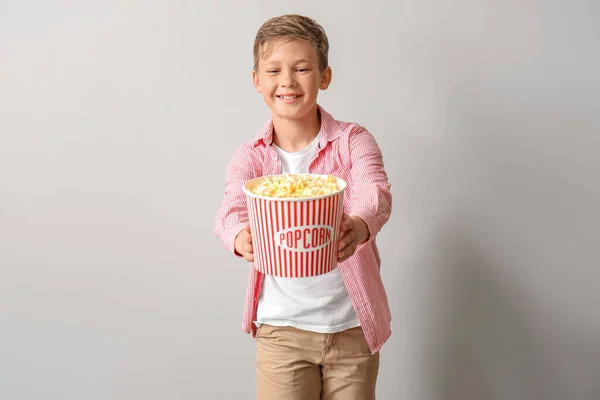 Smiling Little Boy Bucket Tasty Popcorn Light Background — Stock Photo, Image
