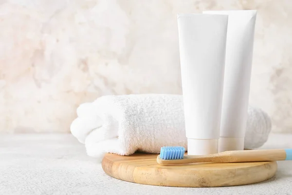 Wooden Toothbrush Pastes Towel Light Table — Stock Photo, Image