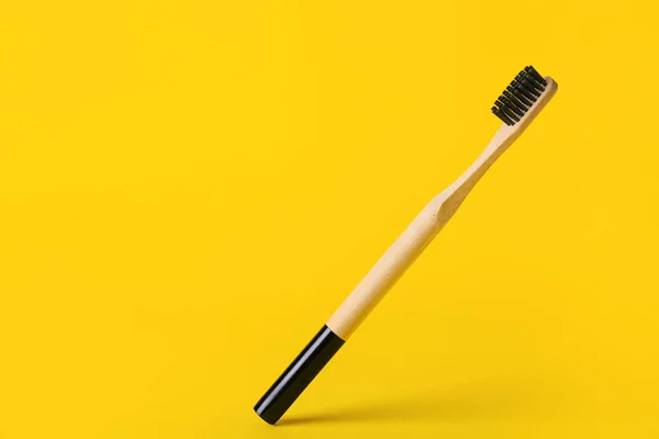 Wooden Toothbrush Yellow Background — Stock Photo, Image