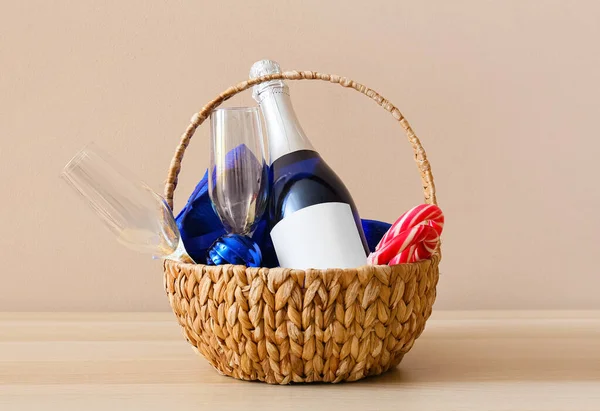 Basket Bottle Champagne Glasses Candy Canes Table Color Wall — Stock Photo, Image