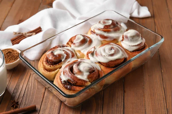 Baking Dish Tasty Cinnamon Rolls Cream Wooden Background — Stock Photo, Image