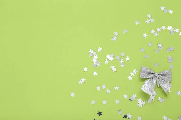 Beautiful Confetti Bow Green Background — Stock Photo, Image