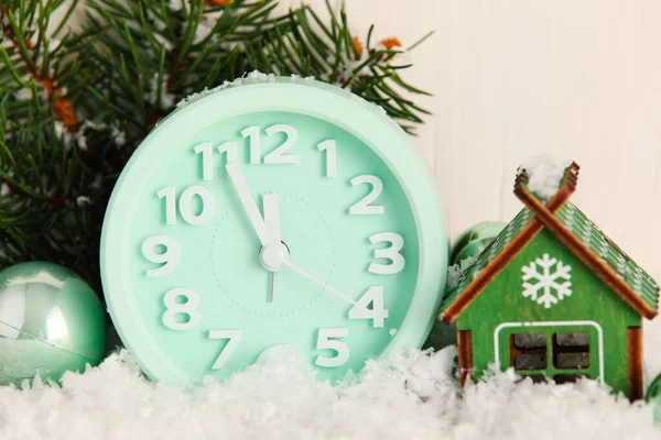 Alarm Clock Christmas Decorations Snow Light Background — Stock Photo, Image