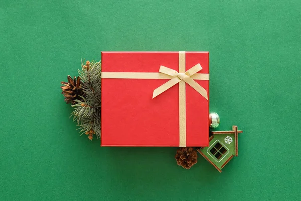 Composition Christmas Gift Box Model House Fir Branch Green Background — Stock Photo, Image