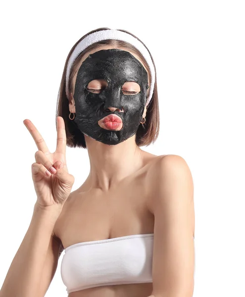 Jovem Com Máscara Carvão Ativado Seu Rosto Mostrando Gesto Vitória — Fotografia de Stock