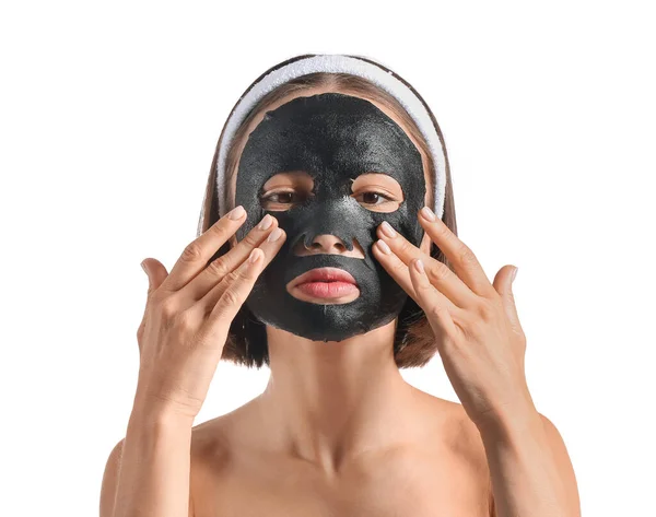 Young Woman Activated Charcoal Mask Her Face White Background — Stock Photo, Image