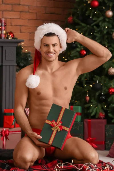 Sexy Young Man Santa Hat Christmas Gift Home — Stock Photo, Image