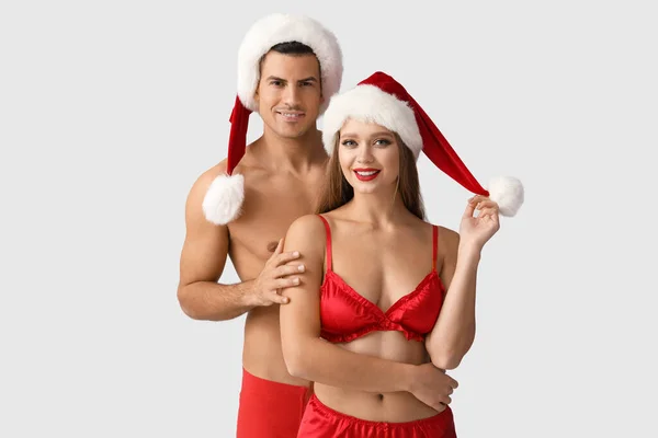 Sexy Young Couple Underwear Santa Hats Light Background — Stock Photo, Image