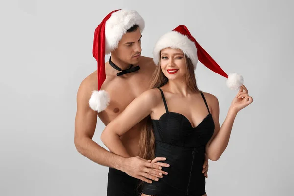 Sexy Young Couple Underwear Santa Hats Light Background — Stock Photo, Image