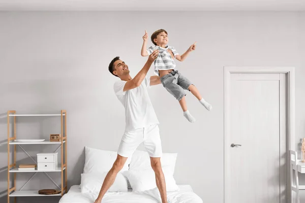 Man His Little Son Playing Bedroom — Stock Photo, Image