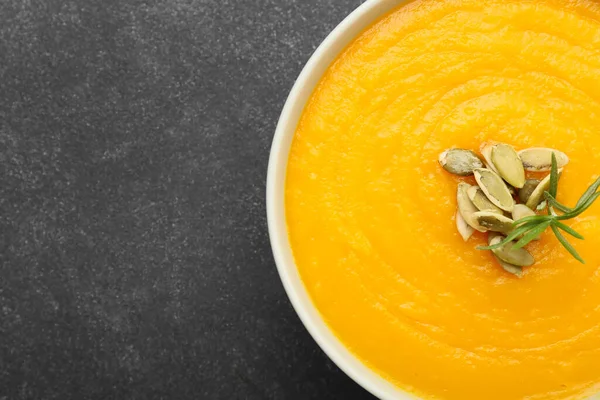 Bowl Tasty Pumpkin Cream Soup Black Background Closeup — Stock Photo, Image