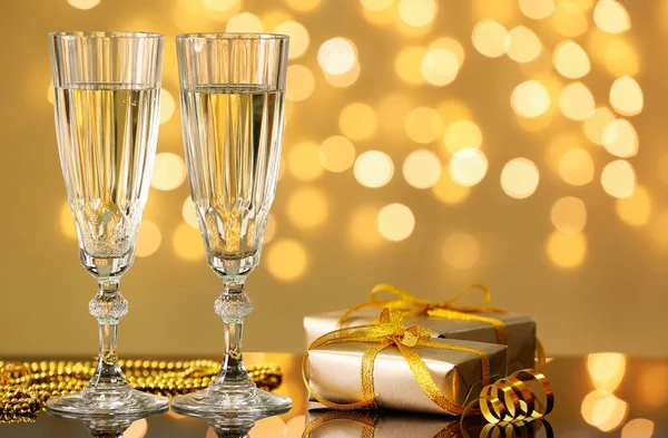 Glasses Champagne Gift Box Table Blurred Lights — Stock Photo, Image