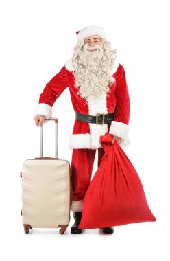 Beyaz arka planda çantası ve bavulu olan Noel Baba