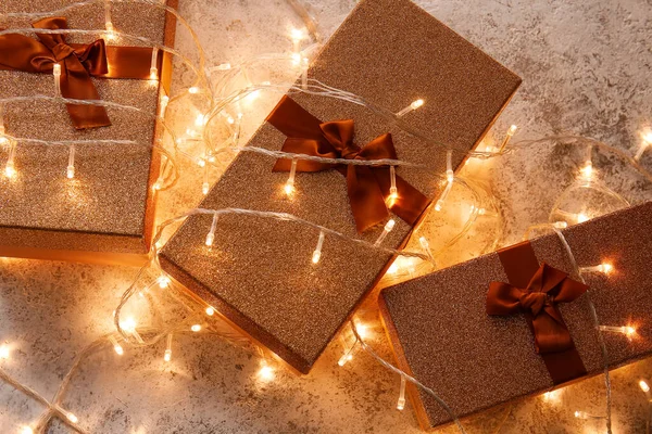 Gift Boxes Beautiful Christmas Lights Light Background — Stock Photo, Image