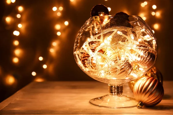 Glass Beautiful Christmas Lights Balls Table Blurred Background — Stock Photo, Image