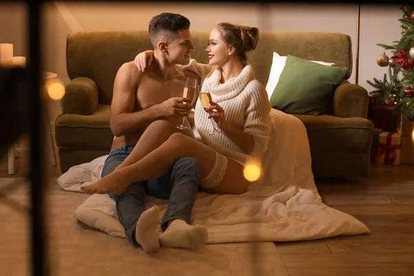 Sexy Young Couple Drinking Champagne While Having Romantic Date Christmas — Stock Photo, Image