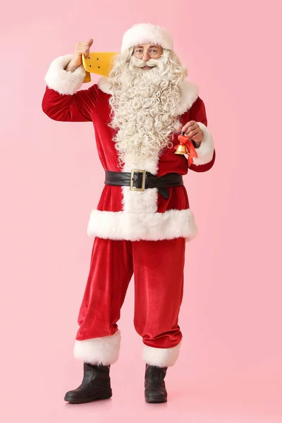 Santa Claus Christmas Bell Skateboard Pink Background — Stock Photo, Image