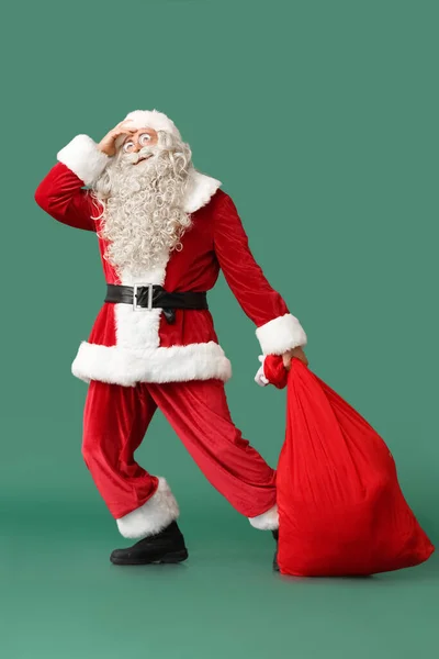 Tired Santa Claus Red Bag Green Background — Stock Photo, Image