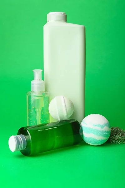 Bottles Cosmetic Products Bath Bombs Green Background — Stock Photo, Image