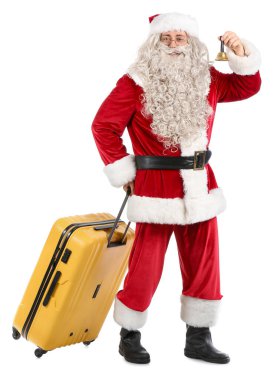 Beyaz arka planda Noel çanı ve bavulu olan Noel Baba