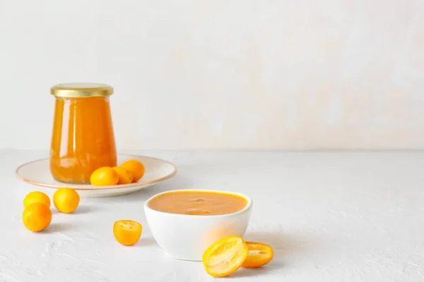 Jar Bowl Tasty Kumquat Jam Fresh Fruits Light Background — Stock Photo, Image