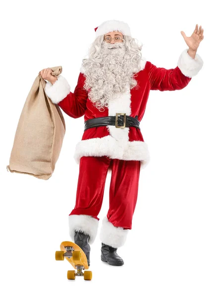白色背景的背包和滑板圣诞老人 — 图库照片